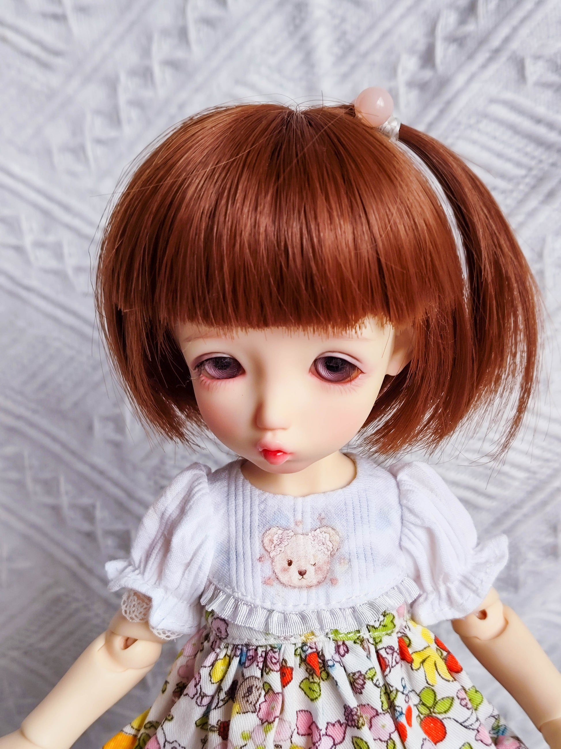Close-up of 1/6 BJD YoSD doll clothes, bear embroidery and puff sleeve detai