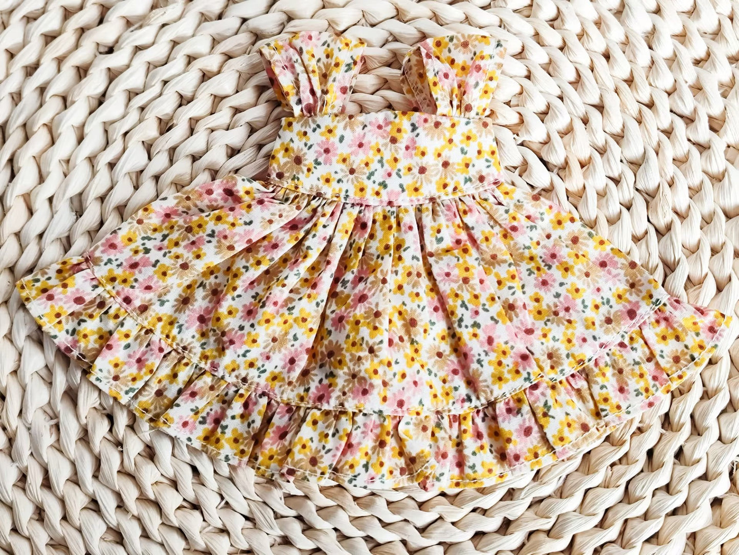 Flat lay photography of 1/6 BJD YoSD doll clothes, sweet floral print summer outfit.