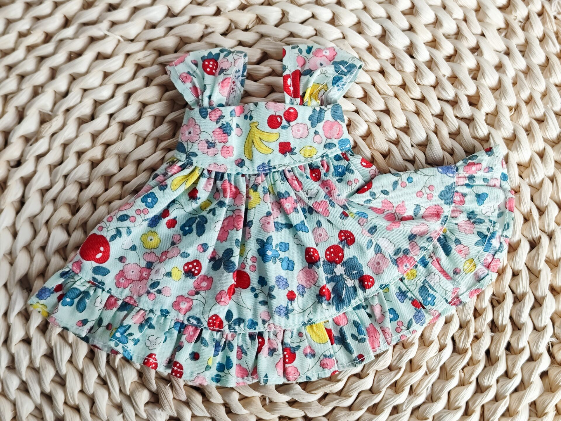 Flat lay photography of 1/6 BJD YoSD doll clothes, sweet floral print summer outfit.