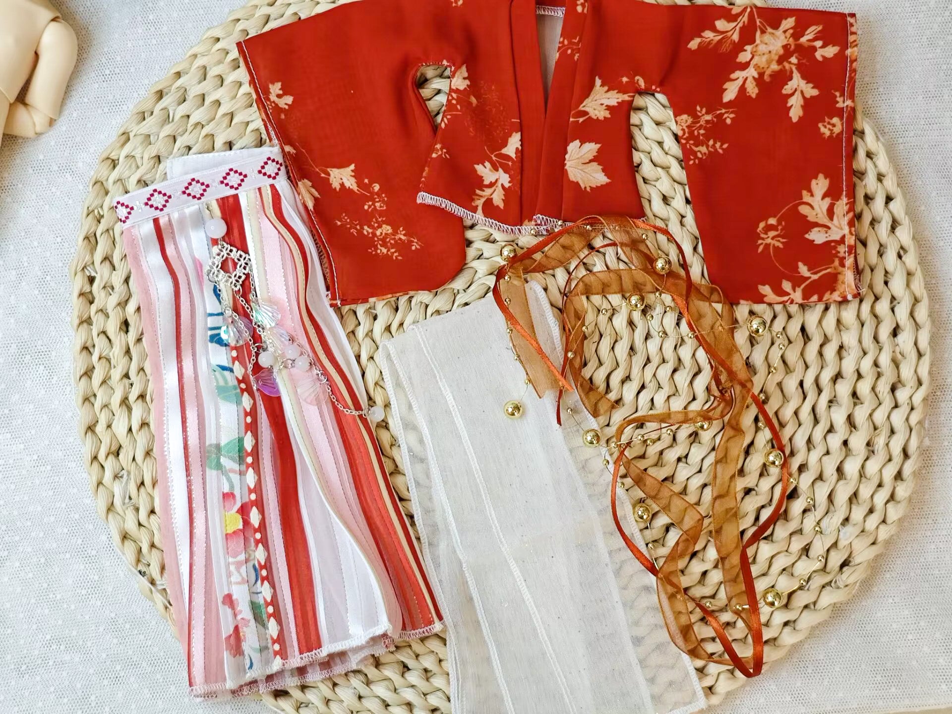Flat lay of 1/6 BJD YoSD doll clothes, handmade Tang Dynasty red Hanfu set.