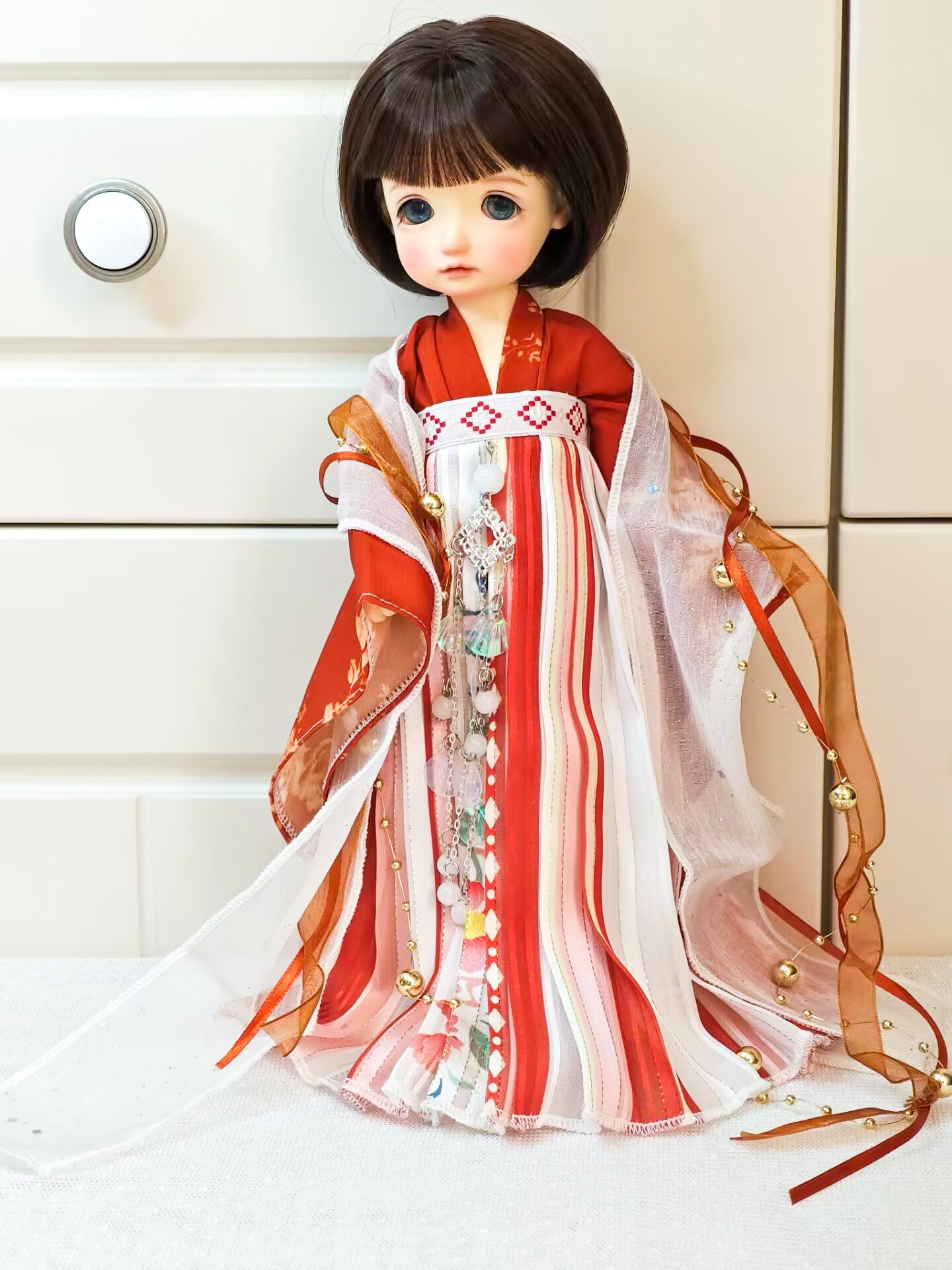 1/6 BJD YoSD doll clothes, traditional red Tang Dynasty Hanfu handmade outfit front view.