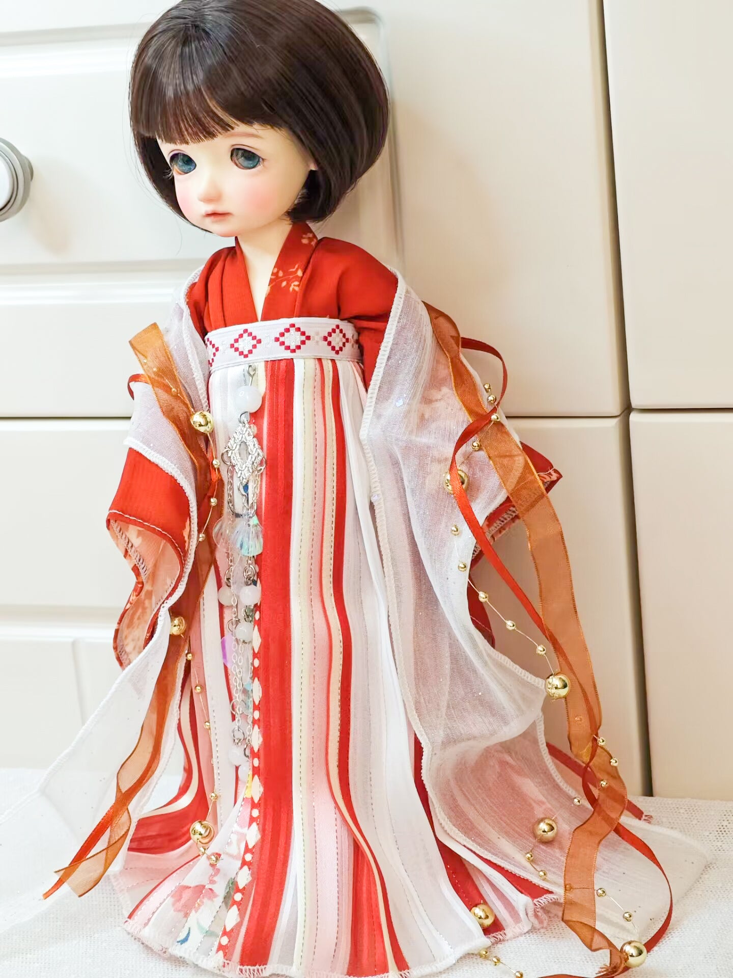 Left profile view of handmade 1/6 BJD YoSD doll clothes, Tang Dynasty Hanfu red dress.