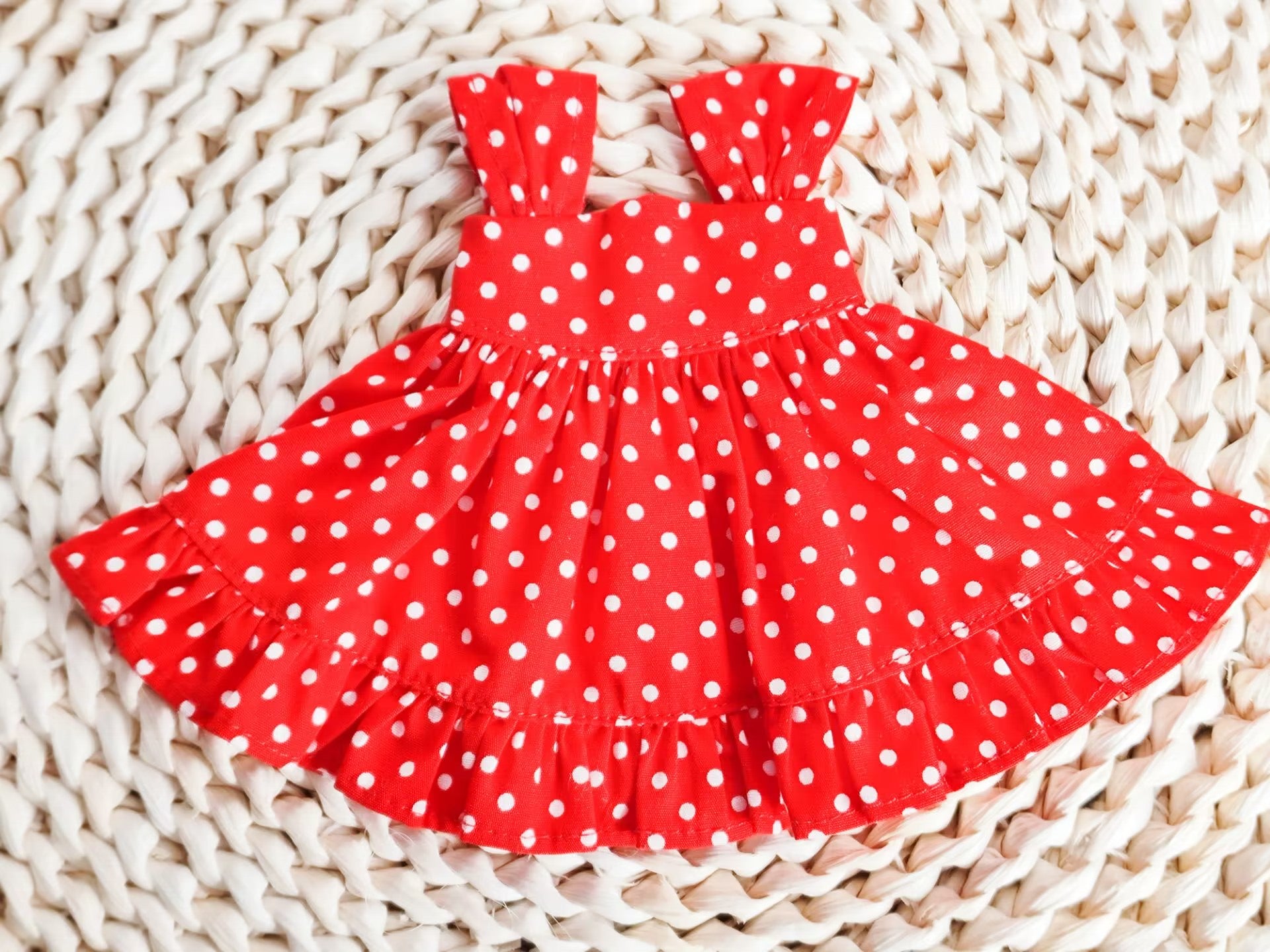 Flat lay photography of 1/6 BJD YoSD doll clothes, vintage-style red polka dot dress set.