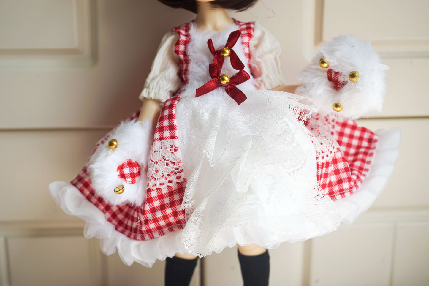 Detail view of the bodice and bow decoration on a 1/6 BJD Lolita princess dress.