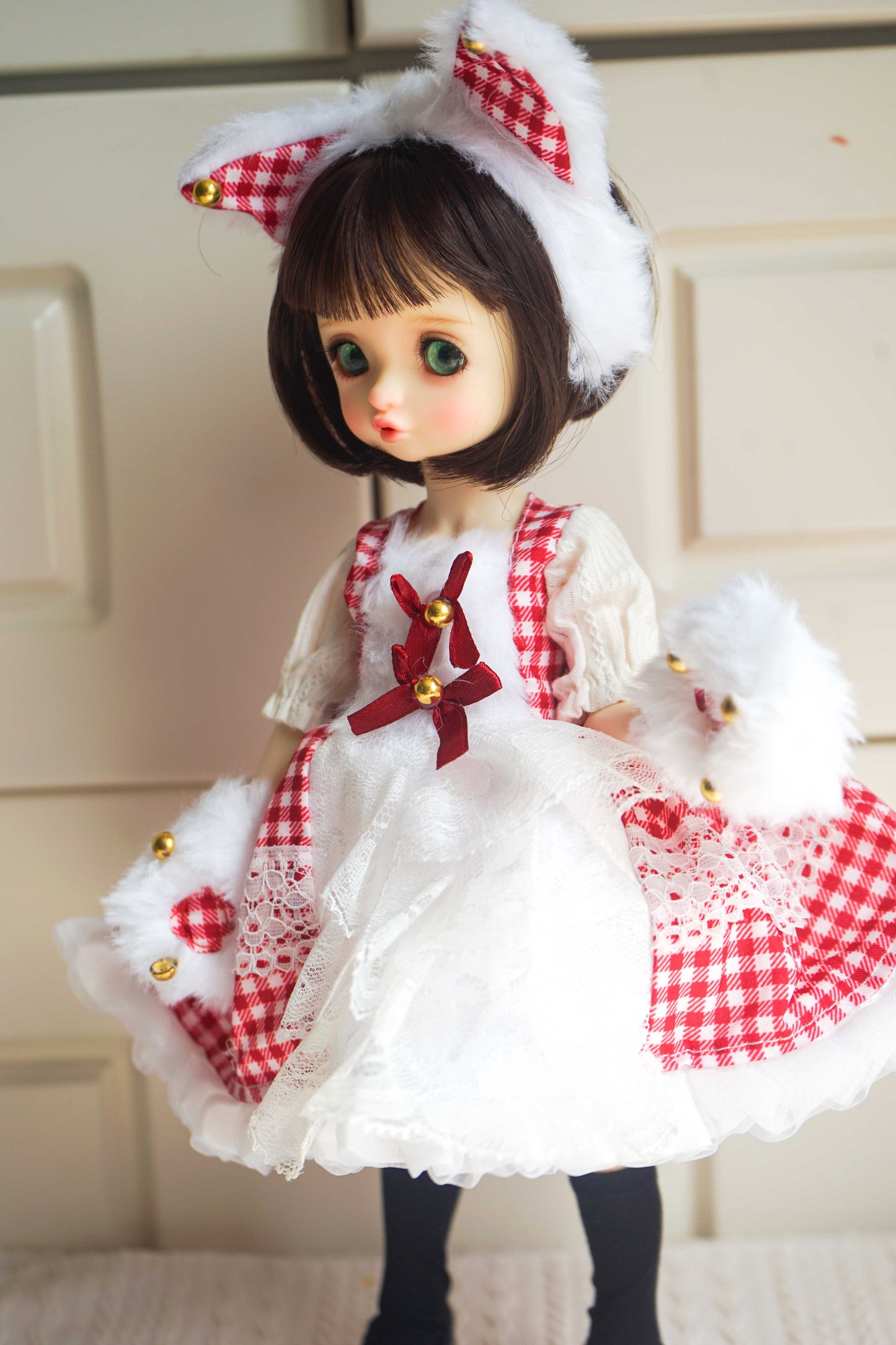 45-degree angle view of a 1/6 BJD doll in a sweet Lolita gingham dress and cat-themed accessories