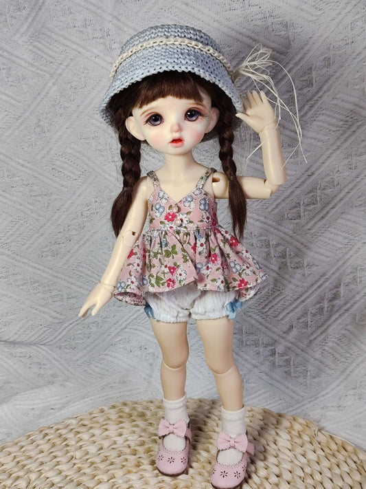 1/6 BJD YoSD doll wearing a handmade cottagecore floral cami top and bloomers set.