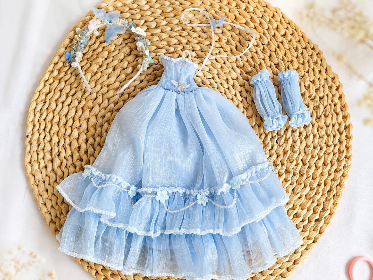 Flat lay photography of Blythe handmade blue fairy princess tulle outfit set.
