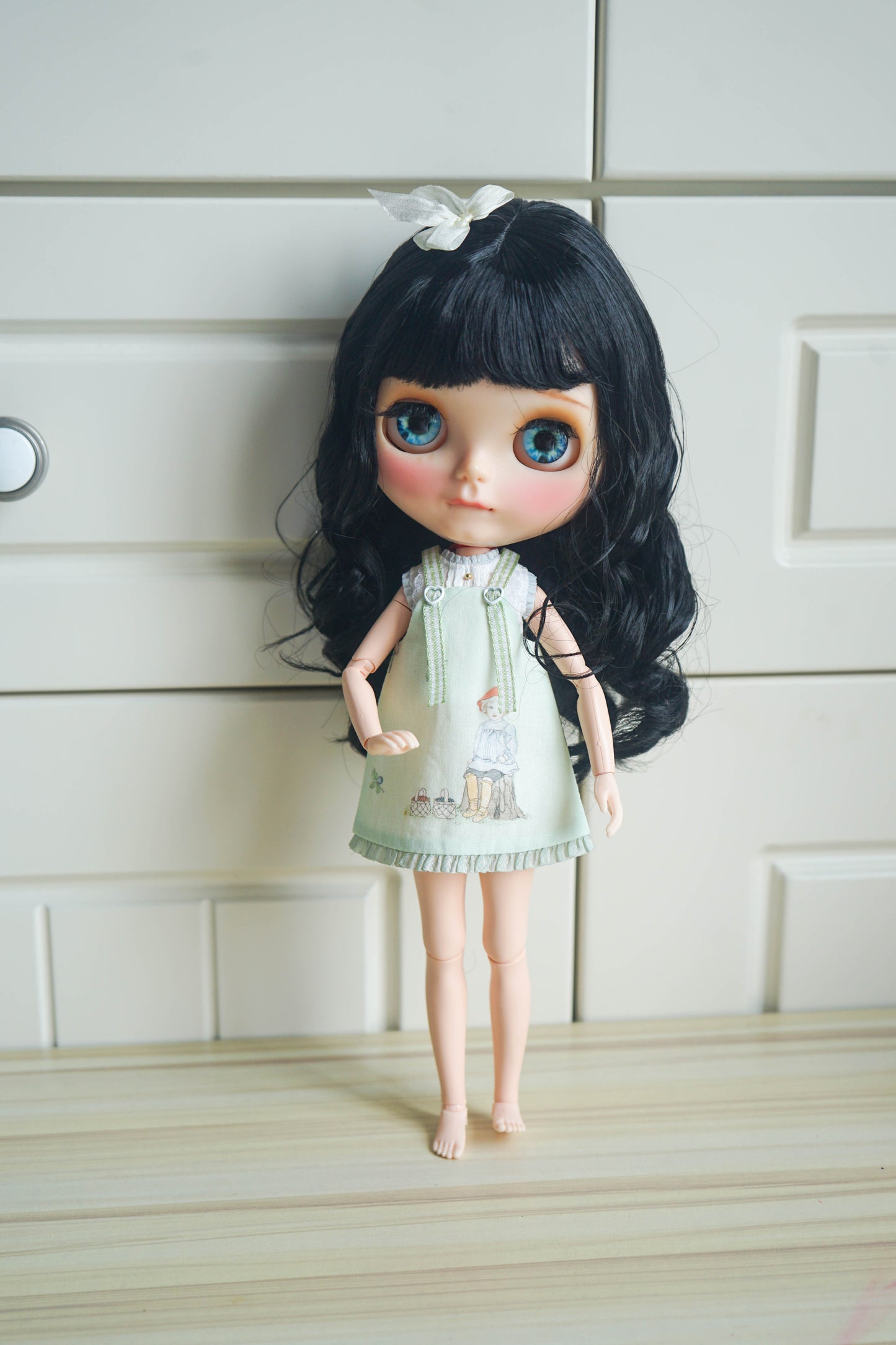 Front view of a handmade pastoral fairy tale pinafore dress for Blythe dolls.