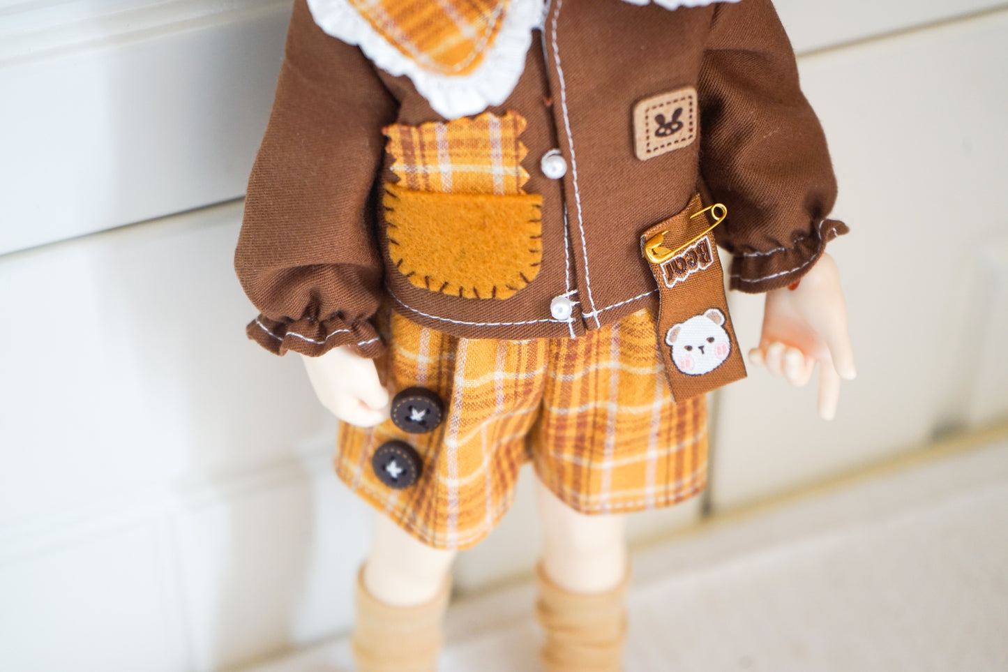 Close-up of cat patch shirt detailing for 1/6 BJD YOSD doll.