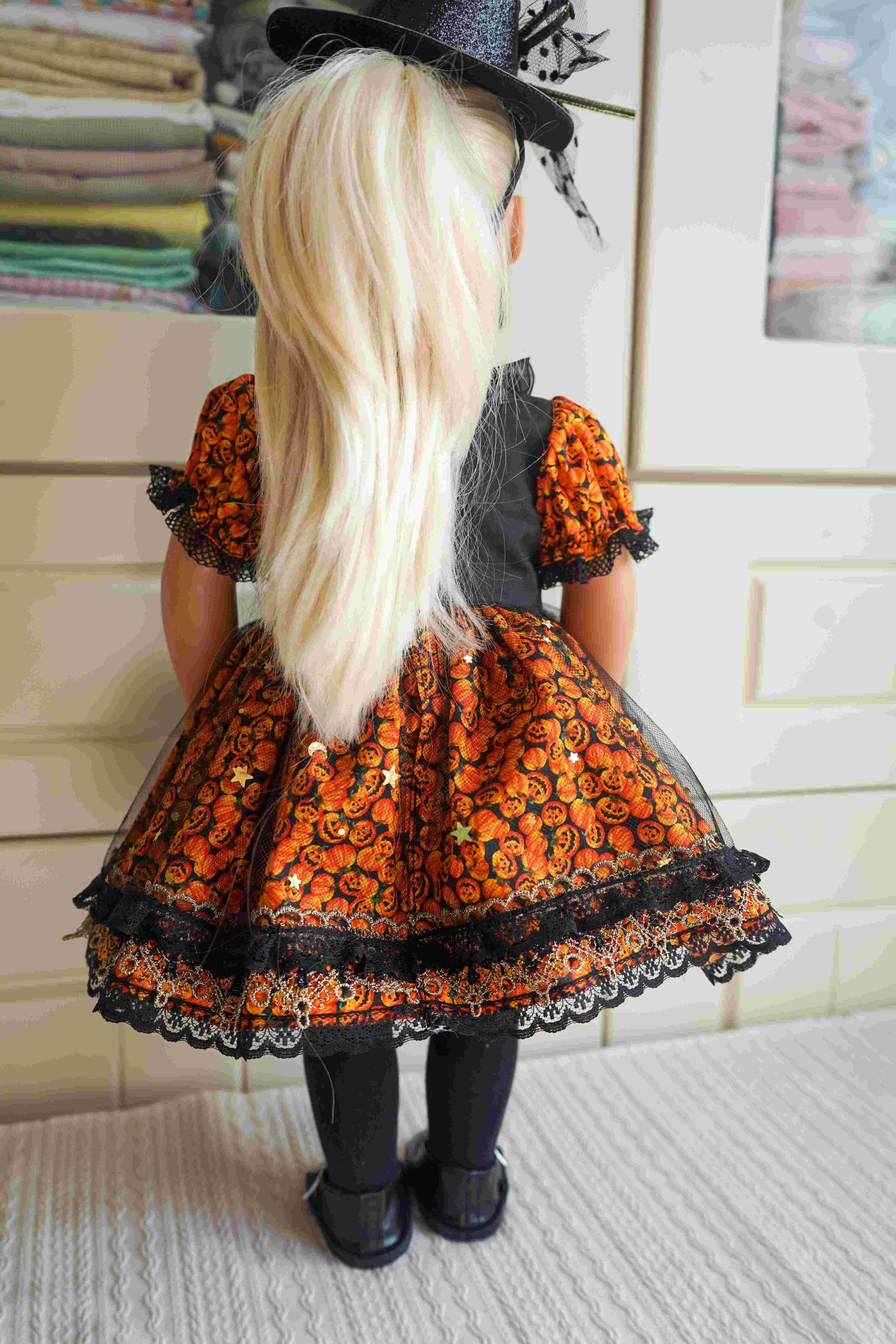 Back view showing the fit and detail of the gothic witch doll dress.