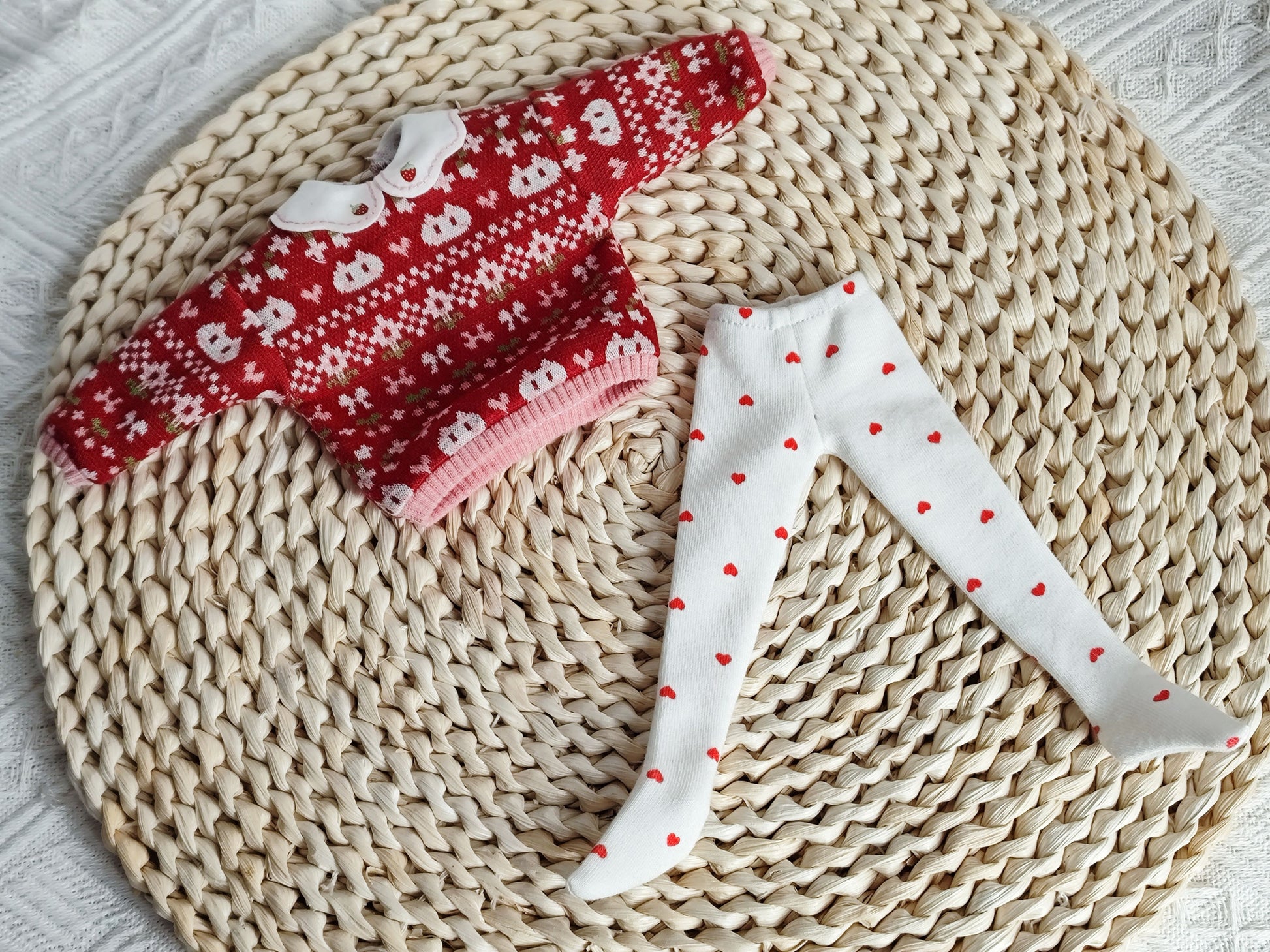 Product flat lay of the handmade Peter Pan collar sweater and tights set for 1/6 BJD dolls.