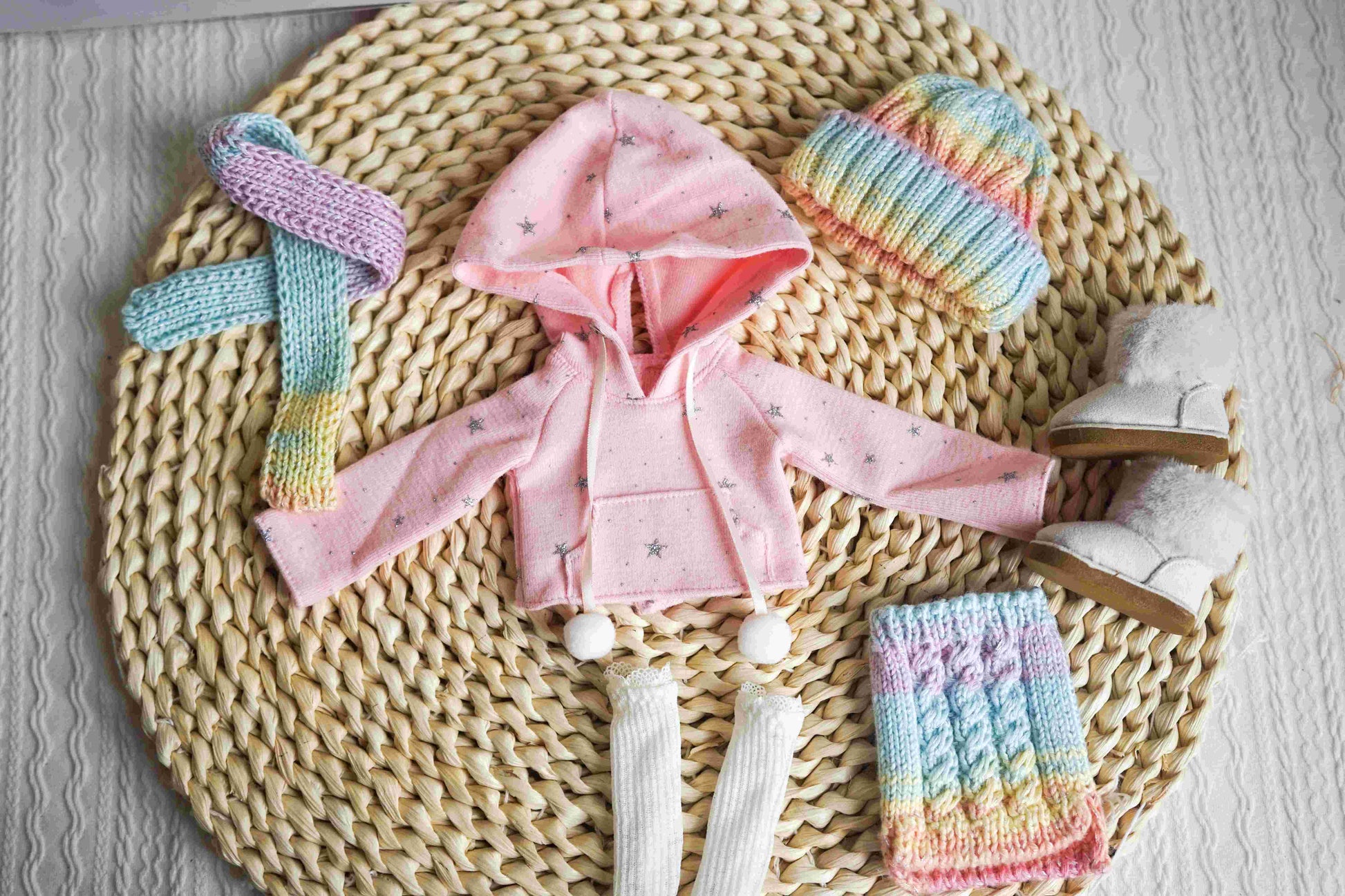 Pink variant of handmade pastel rainbow knit winter set for BJD.