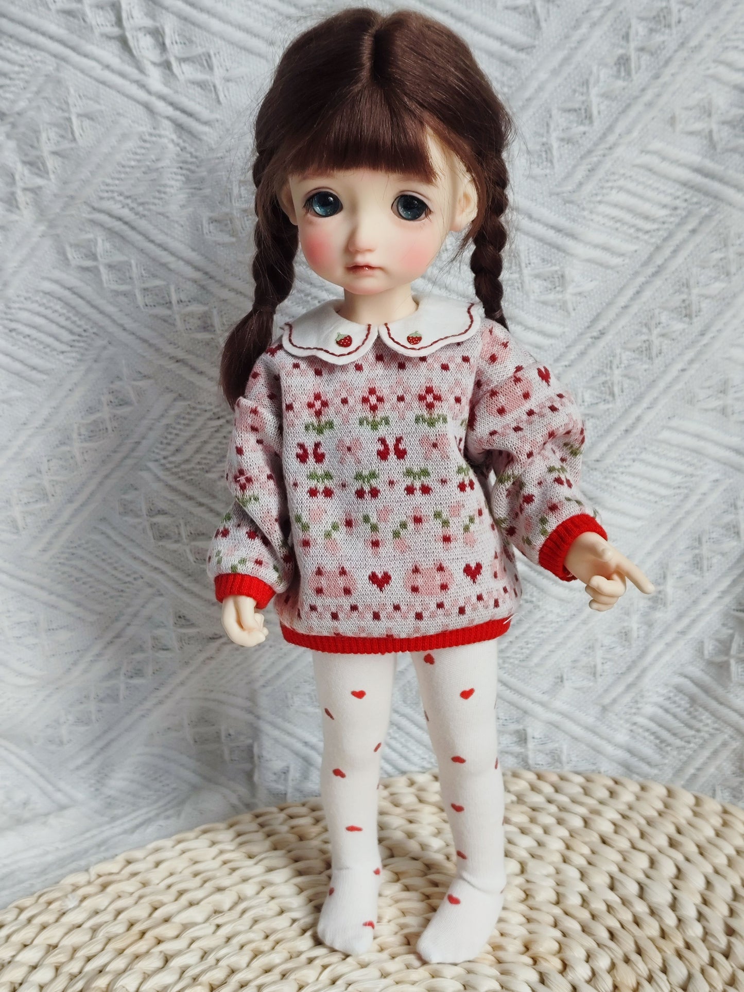 1/6 BJD YoSD doll wearing a handmade Peter Pan collar sweater and tights outfit.