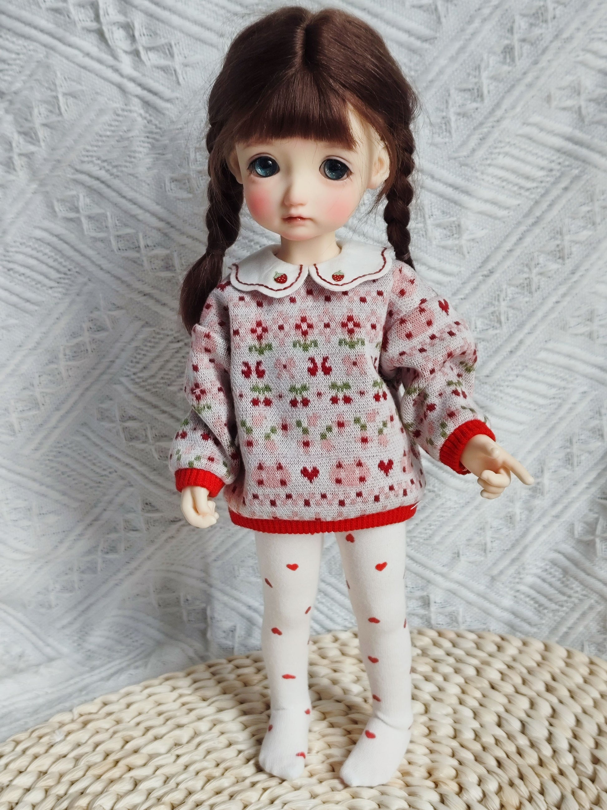1/6 BJD YoSD doll wearing a handmade Peter Pan collar sweater and tights outfit.