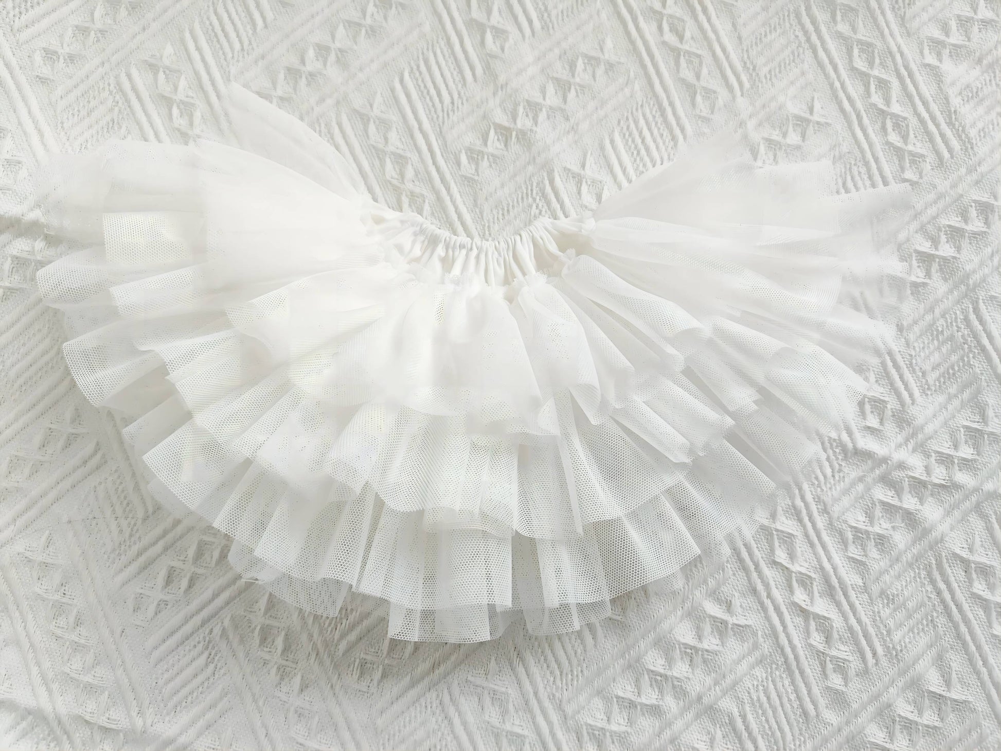 Detailed view of the doll socks and overall coordinated ensemble