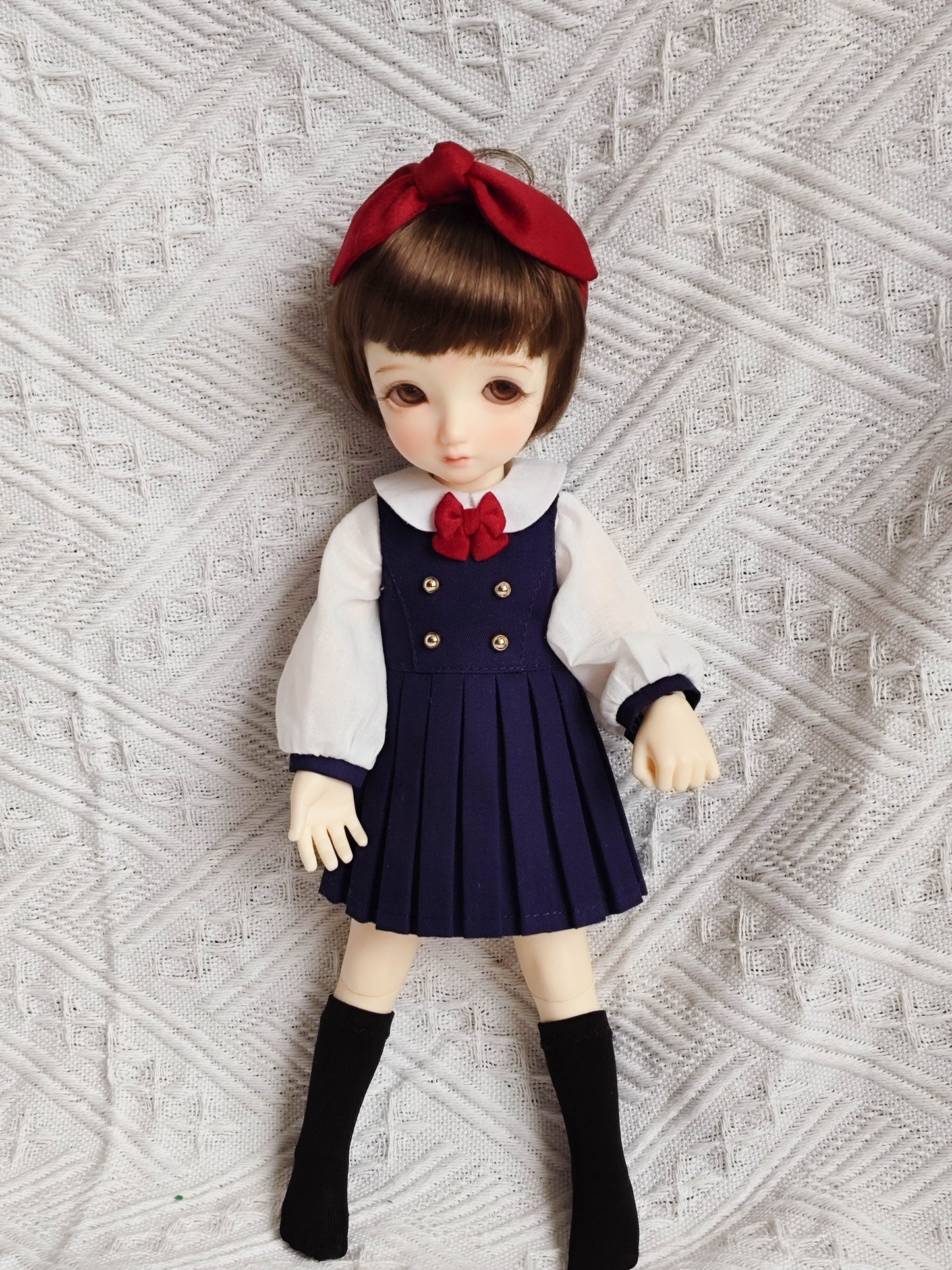 1/6 BJD YoSD doll wearing a handmade pleated school uniform outfit.