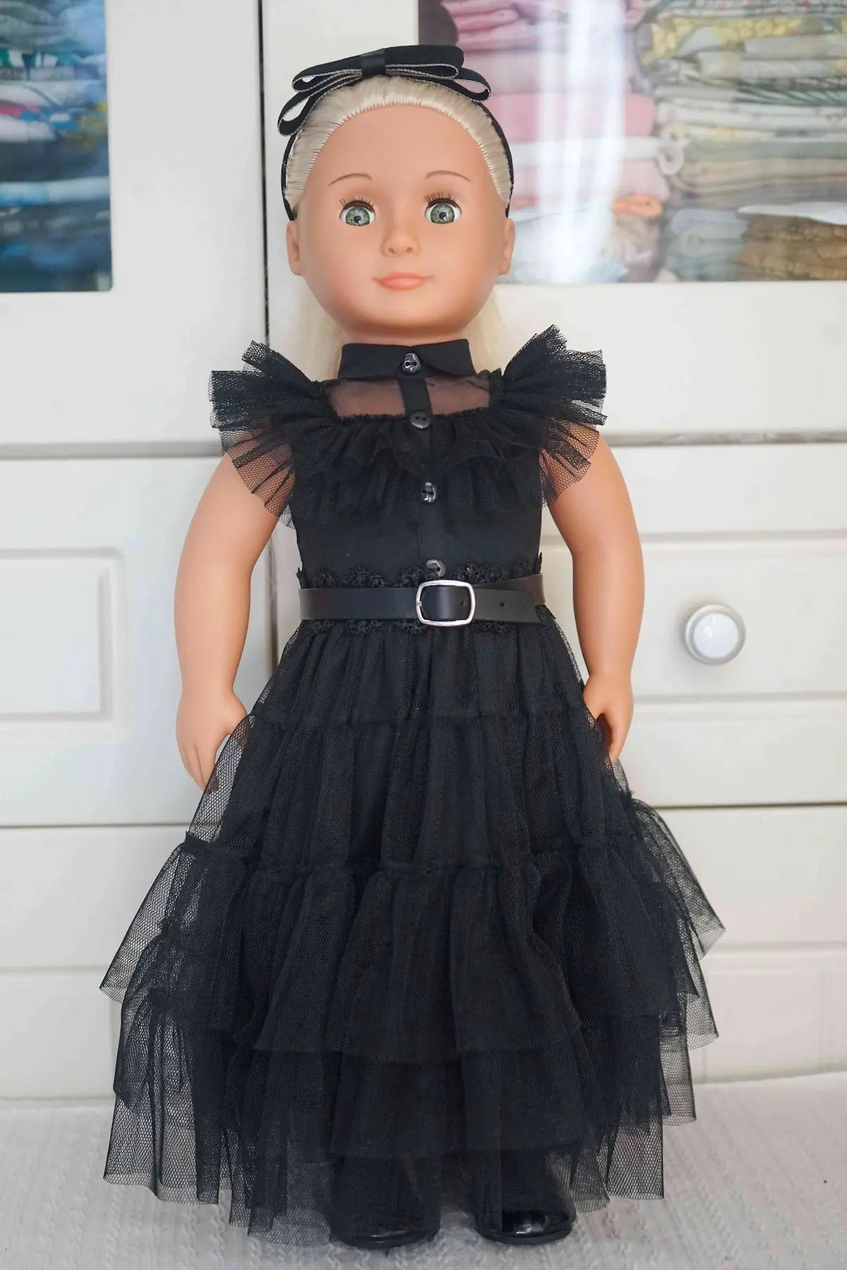 18-inch doll wearing a 5-piece Wednesday-inspired gothic black tiered tulle dress.