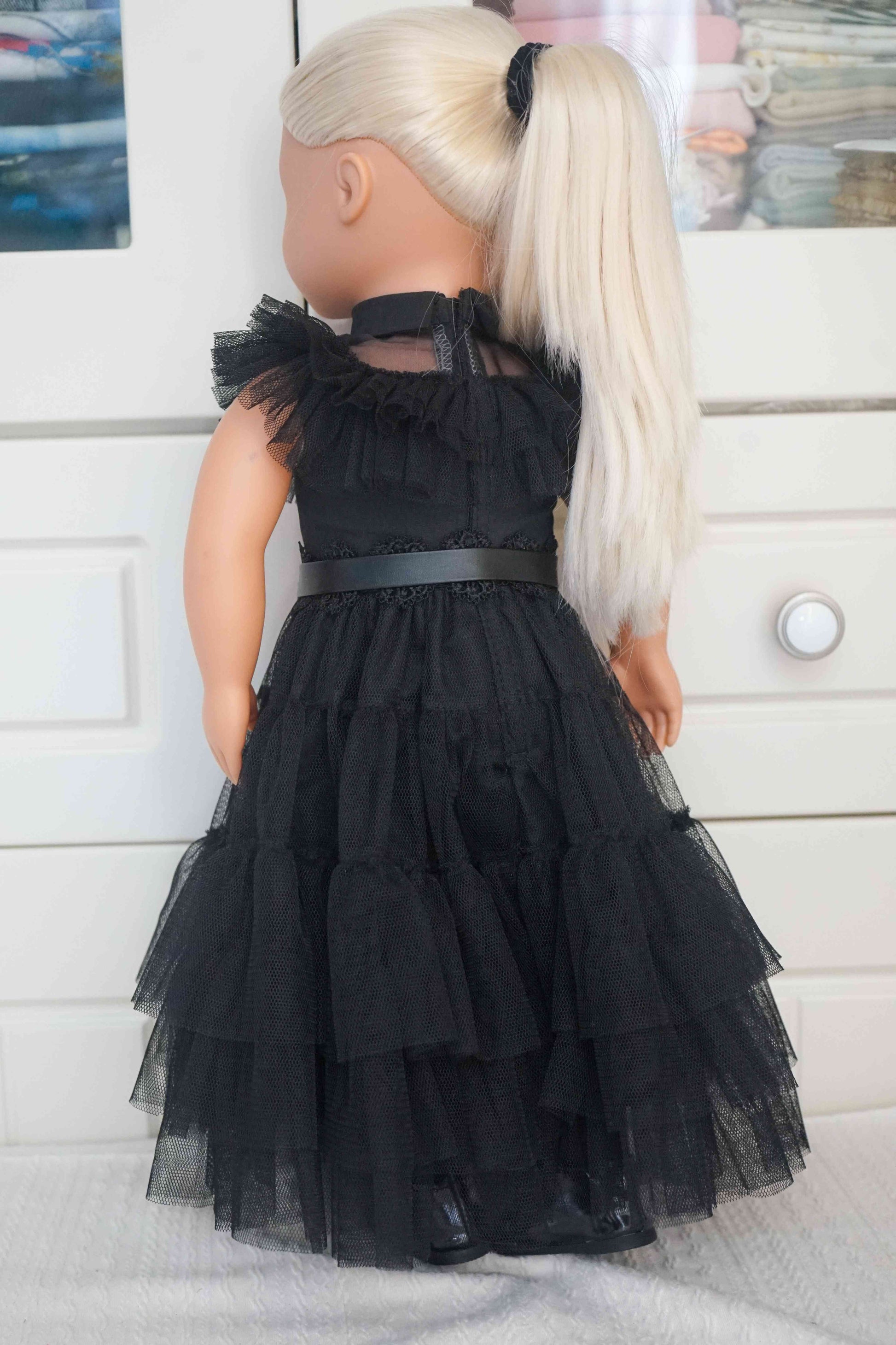 Back view showing the fit and tulle layers of the gothic dress for 18-inch dolls.